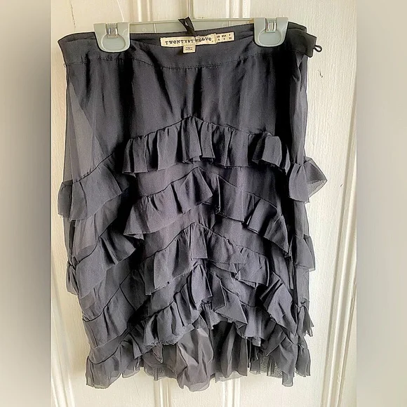Twenty8Twelve Amelia black silk ruffle skirt.
Size 4 - Picture 2 of 7